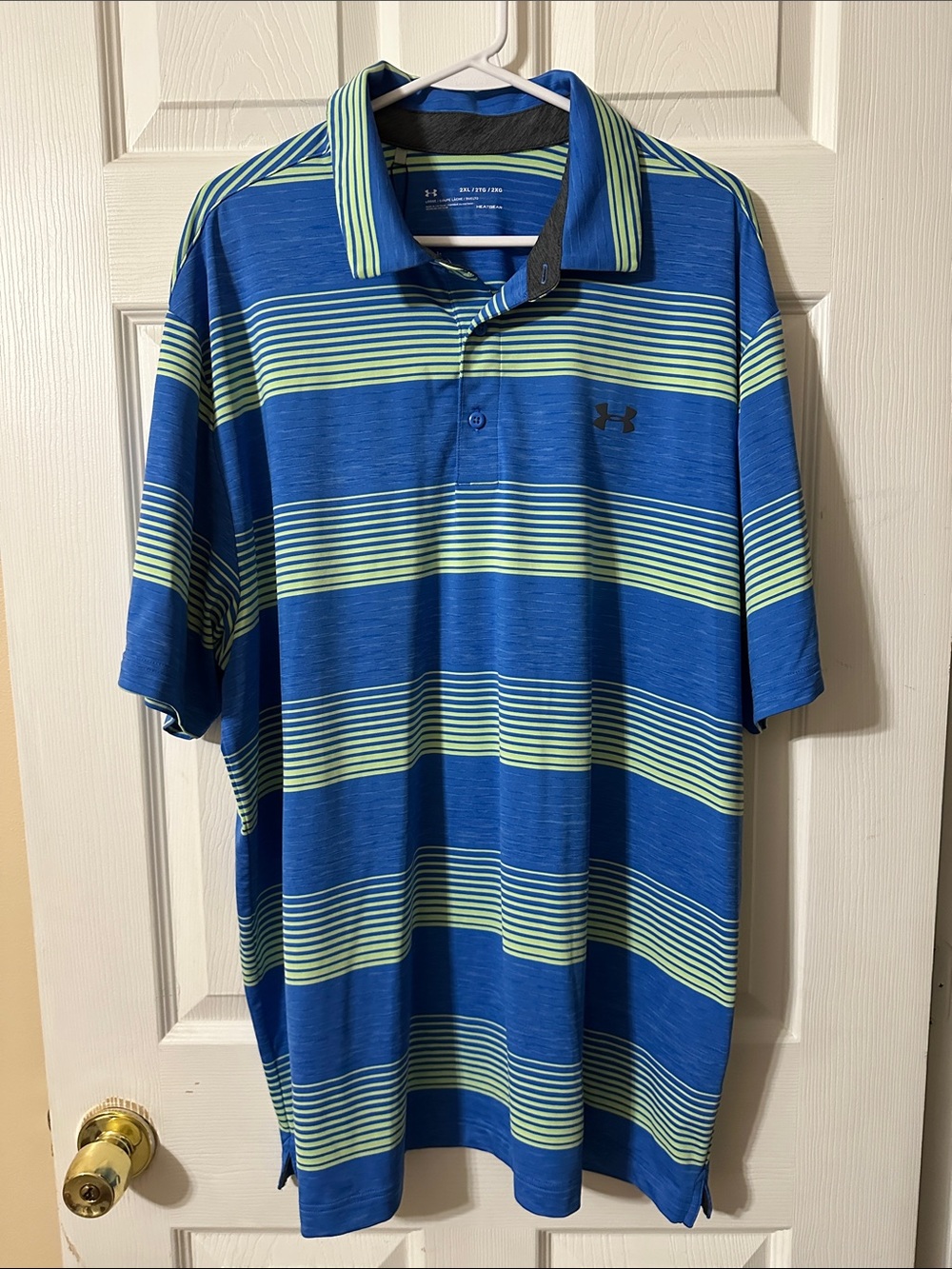 Under Armour Blue Polo with Light Green Stripe Accents